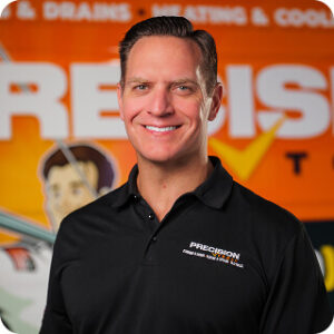 Headshot of Ben Wackerlin in a Precision Today polo shirt