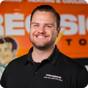 Headshot of Jacob Anderson in a Precision Today polo shirt